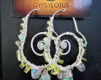 Emeralds, Peridot and Labradorite wire wrapped on sterling silver spiral hoops. Earrings handmade by Gypsy Lotus