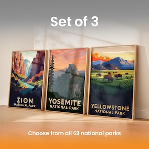 May include: Set of three framed art prints featuring national park landscapes. The prints showcase Zion, Yosemite, and Yellowstone National Parks, with vibrant colors and stylized illustrations. Text includes park names. The phrase "Choose from all 63 national parks" is also visible.