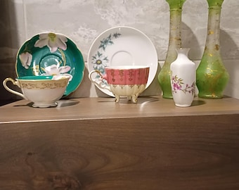 Vintage Teacup and saucer, vintage Teacup, miniature bud vase 4" tall, and a pair of 8.25" vases.