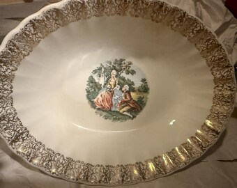 Plato antiguo de pareja de enamorados de la época colonial con borde de filigrana de oro de 22k.