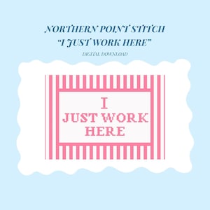 May include: A digital download featuring a cross-stitch design. The design includes the text "I JUST WORK HERE" in pink pixelated letters, set against a white background with pink vertical stripes, all within a decorative frame.