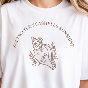 Minimalist Beach Tee | Boho Floral Conch Shell | Saltwater Sunshine