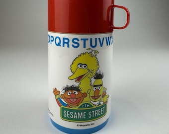 Termo vintage de Barrio Sésamo con el alfabeto, con Big Bird, Burt y Ernie.