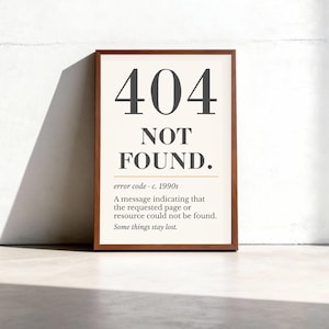 May include: A rectangular framed print featuring the text 404 NOT FOUND. Below this, the text reads error code c. 1990s, followed by A message indicating that the requested page or resource could not be found. Some things stay lost. The frame is brown.