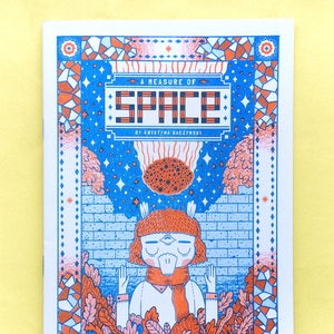 May include: A blue and orange illustrated book cover with the title "A Measure of Space" by Kristina Baczynski. The cover features a cartoon character with a red scarf and a blue background with stars and a brick wall.