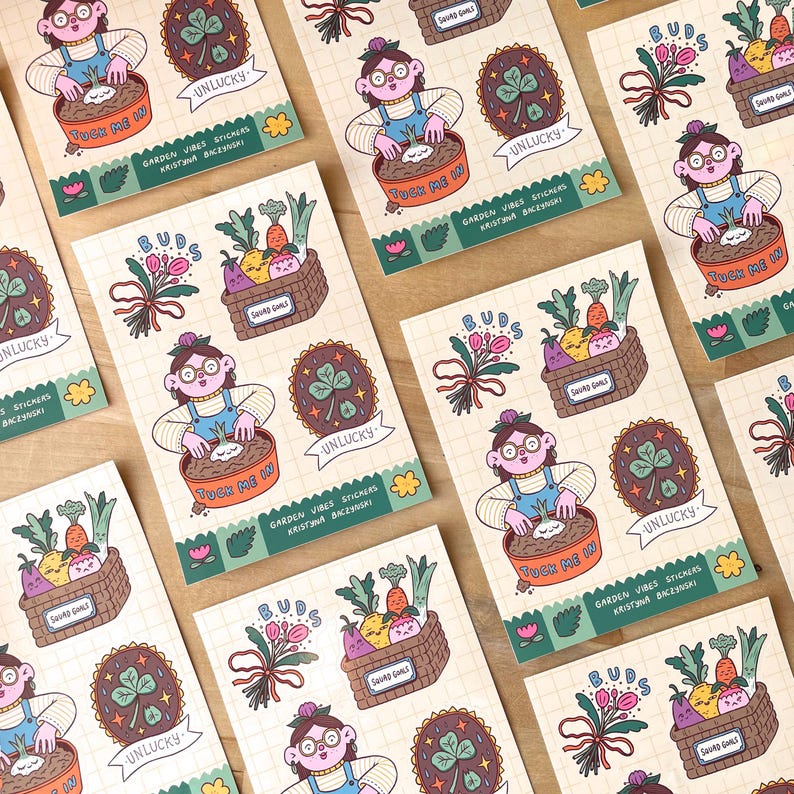 May include: A collection of illustrated stickers with a garden theme. The stickers feature a person gardening, a basket of vegetables, a four-leaf clover, and the text "Unlucky" and "Tuck Me In". The stickers are on a grid-patterned background.