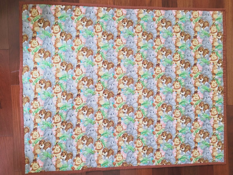 Quilted Jungle Friends Baby Blanket with Jungle Animals Backing image 6