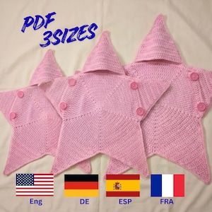 May include: Three light pink star-shaped crochet blankets in different sizes, each featuring a hood and two buttons on the front points. The text "PDF 3SIZES" is visible in blue at the top, and four national flags with labels are at the bottom.