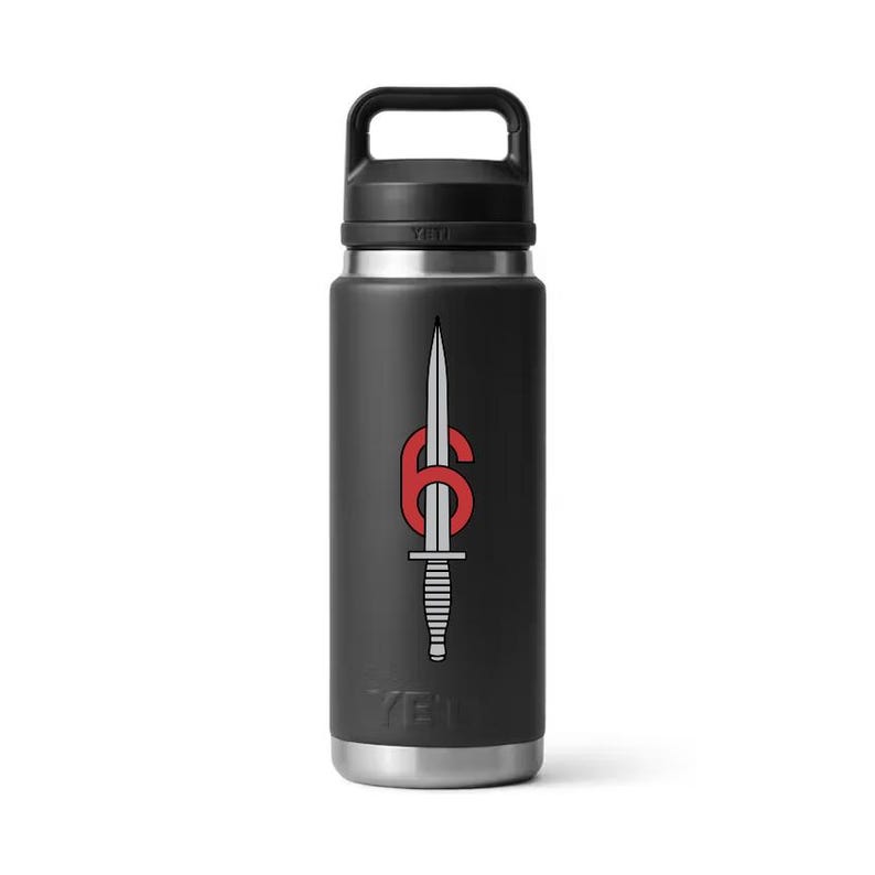May include: Black insulated water bottle with a handle. The bottle features a red and white graphic of a dagger and the number 6. The brand name "YETI" is printed at the bottom.