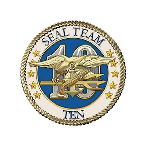 May include: A round emblem with a gold rope border and the words "SEAL TEAM TEN" in white. The center features a blue background with a gold eagle, trident, and anchor design, and gold stars.