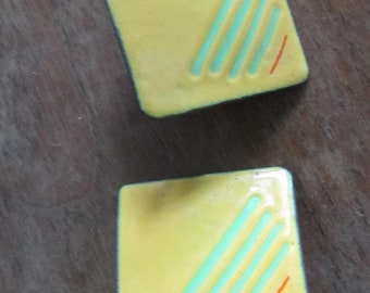 enamel on copper clip earrings 1 1/4" square maine artist signed yellow w green stripes