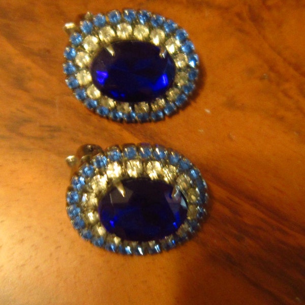 vintage clip earrings cobalt rhinestones with pale blue and clear stones 1" by 1/2"