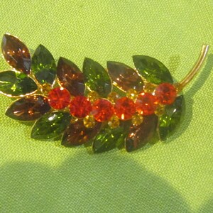 stunning rhinestone brooch 2 1/2&quot; long red green  yellow stones