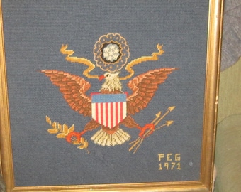 needlepoint of the great seal of the USA 18" square signed and dated 1971