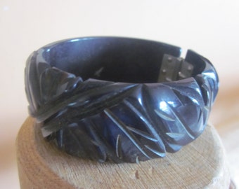 blk bakelite carved clamper bracelet, bakelite bracelet