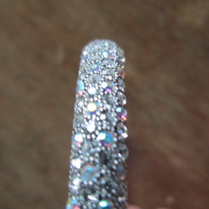 two signed joan rivers crystal bangles clear stones and shades of brown rust stones gorgeous
