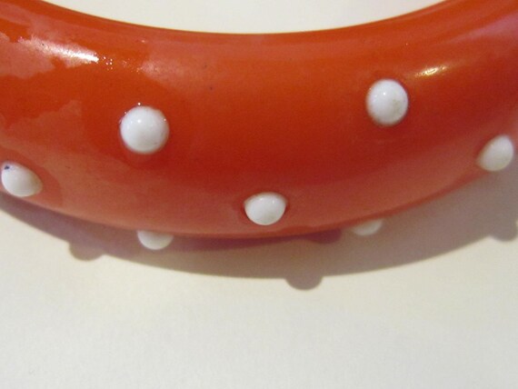 RARE orange bakelite bangle with white raised dot… - image 2