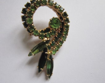 beautiful rhinestone pin shades of green lovely 2" long..nice vintage brooch