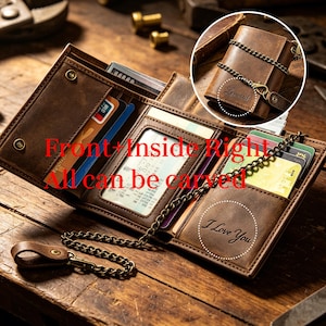 May include: A brown leather tri-fold wallet featuring a metal chain, multiple card slots, and a clear ID window. The wallet displays the engraved text "Leonard" on the exterior and "I Love You" on the interior, with red text overlaying the image.
