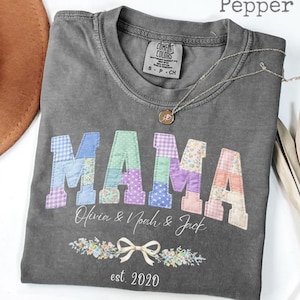 May include: A white ceramic mug with a black handle and the text "But First, Coffee" in a handwritten style. The mug is on a white surface. The mug is 4 inches tall.