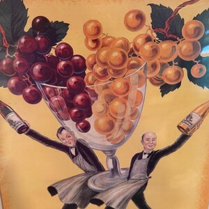May include: A vintage-style poster featuring two servers in black suits and grey aprons holding wine bottles, supporting a large glass filled with red and green grapes. The text reads LES VINS SELECTIONNES UNION DANS VOTRE VERRE.
