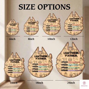 six different sizes of a wooden cutout depicting a Star Wars character, specifically the Millennium Falcon, with the text "I AM THEIR FATHER" printed on it.