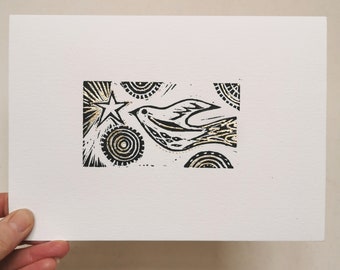 Star and Song bird original lino print in gold coloured metal leaf no.1