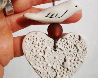 White dove and heart ceramic hangings