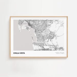 May include: A framed map print of Chula Vista, California, in grayscale. The map shows the city's layout with streets and geographical features. The text "CHULA VISTA" is at the bottom left, with coordinates and "CALIFORNIA, UNITED STATES" at the bottom right.
