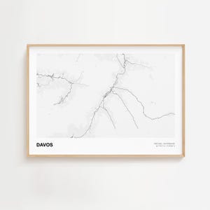 May include: A set of three ceramic mugs with a speckled, matte finish. The mugs are in shades of cream, light gray, and dark gray. Each mug has a simple, minimalist design and a rounded handle.