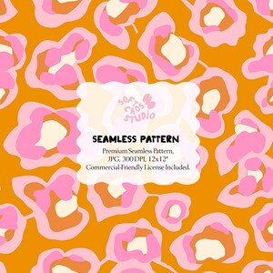 May include: A seamless pattern with abstract floral shapes in pink, peach, and cream on a golden-orange backdrop. The design includes the text "SEAMLESS PATTERN" and dimensions of 30.48cm x 30.48cm.