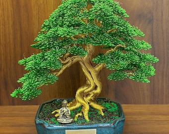 Scultura bonsai con tronco verde dorato e filo portafortuna: arte dell'albero della vita