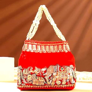 Embroidered Silk Potli Bag: Yellow Floral Bridal Handbag with Pearl Handle