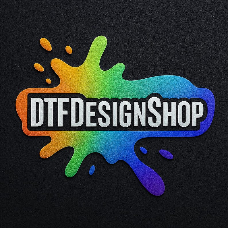 May include: A colorful logo for DTFDesignShop, featuring the text in white, set against a vibrant, multi-colored splash design. The background is a textured black surface.