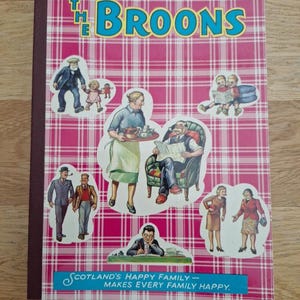 May include: A vintage copy of "The Broons" comic book. The cover is pink and white plaid, with illustrations of a family. Text reads "Scotland's Happy Family - Makes Every Family Happy."