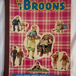 May include: A vintage book cover with a pink tartan pattern and the title "THE BROONS" in blue and yellow. The cover features illustrations of a family, with the text "SCOTLAND'S HAPPY FAMILY - MAKES EVERY FAMILY HAPPY."