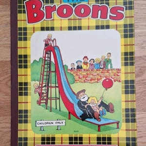 May include: A vintage copy of "The Broons" comic book. The cover features a family on a playground slide, set against a yellow and black tartan background. Text includes "The Broons" and "Children Only".