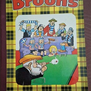 May include: A set of three ceramic mugs with a speckled, matte finish in cream, light grey, and dark grey. Each mug has a simple, minimalist design, suitable for coffee or tea.