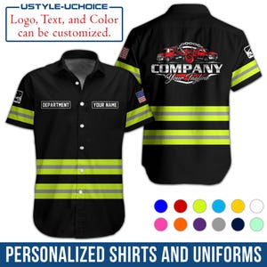 May include: Black short-sleeved shirt with neon yellow stripes and accents. The front features two name tag areas and the text "DEPARTMENT" and "YOUR NAME". The back displays a tow truck graphic and the text "COMPANY Your Tagline". The shirt is part of a collection of personalized shirts and uniforms.