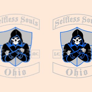 May include: A graphic design featuring a hooded skull figure with crossed arms, set within a shield shape. The design includes the text "Selfless Souls" above and "Ohio" below, with "LE MC" on the sides. The color scheme is black, blue, and white.