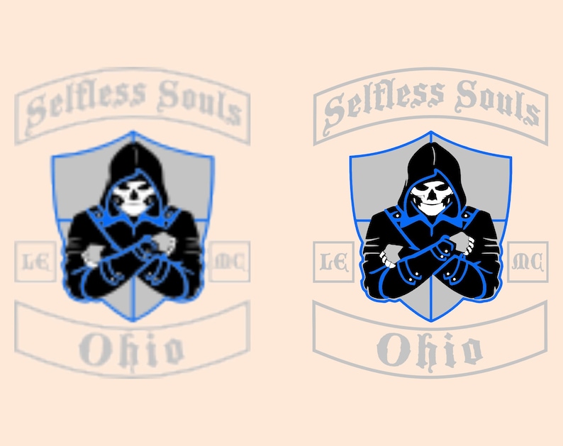 May include: A graphic design featuring a hooded skull figure with crossed arms, set within a shield shape. The design includes the text "Selfless Souls" above and "Ohio" below, with "LE MC" on the sides. The color scheme is black, blue, and white.