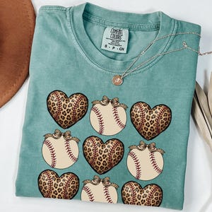 Comfort Colors® Coquette Baseball Shirt, Leopard Heart Shirt, Womens Baseball Shirt, Baseball Lover Shirt, Baseball Season Bow Tee SP32