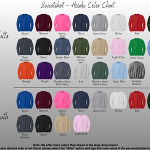 May include: Color chart for sweatshirts and hoodies, featuring a variety of colors for adults and youth. Colors include royal blue, maroon, safety pink, navy, sport grey, white, red, and forest green. The text reads "Sweatshirt - Hoodie Color Chart."