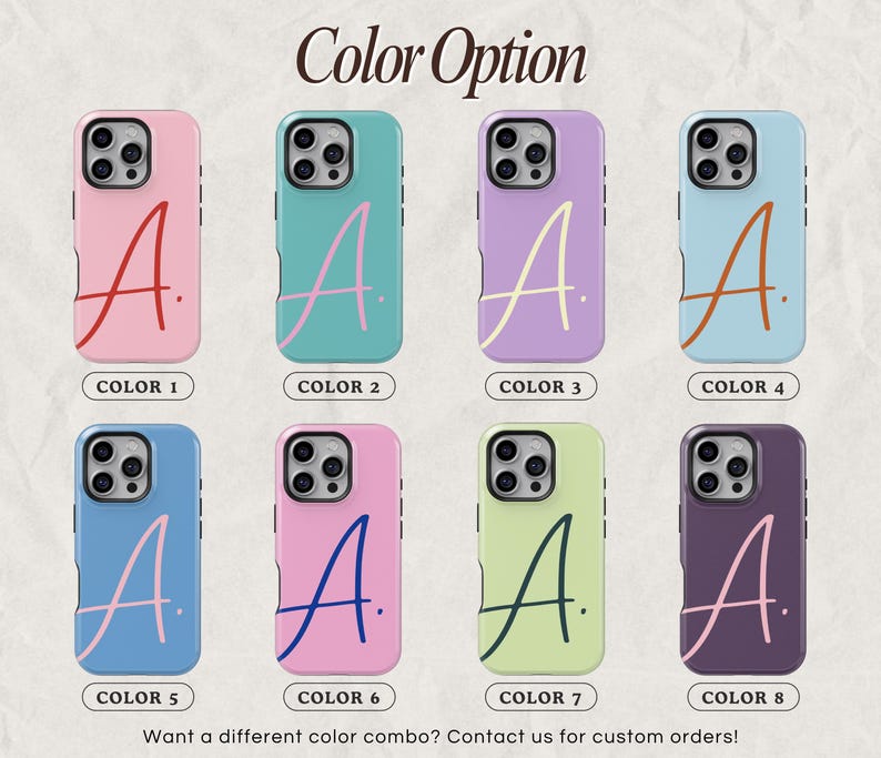 May include: Eight phone cases in various colors, each featuring a stylized letter "A". The cases are in shades of pink, teal, lavender, blue, and green, with the letter in contrasting colors. Text at the top reads "Color Option".