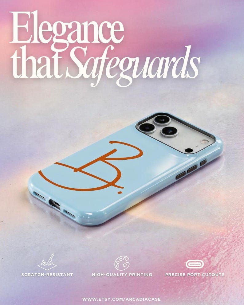 May include: A light blue phone case with an orange letter "B" design. The case has a glossy finish and features the text "Elegance that Safeguards". The case is scratch-resistant and has high-quality printing with precise port cutouts.