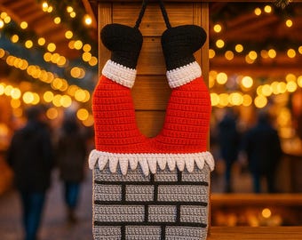 Può includere: Decorazione natalizia fatta a mano con le gambe e gli stivali di Babbo Natale, realizzata con filato rosso e nero. Le gambe capovolte hanno finiture bianche e un design a camino in mattoni grigi nella parte inferiore. Appeso a un cordino nero.