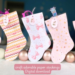 Calendario de adviento digital con 15 diseños rosas y dos tipos de etiquetas numéricas.