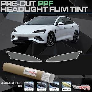 May include: A white car with tinted headlights is displayed, along with pre-cut headlight film tint. The image shows a roll of film and samples in light, medium, and dark smoke, and yellow. The text reads "PRE-CUT PPF HEADLIGHT FLIM TINT."