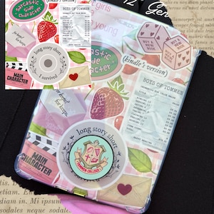 May include: A clear phone case adorned with stickers featuring dice, strawberries, and text such as "hot girls love lizzie young" and "Boys of Tommen." The case has a pink and white gingham design.