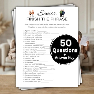 May include: A stack of white paper game sheets with the title "Senior Finish the Phrase" and a black circle with "50 Questions + Answer Key." The game is designed for seniors.
